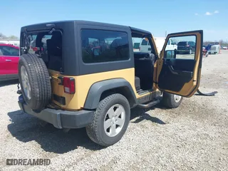 2013 Jeep Wrangler Sport with VIN 1C4AJWAG8DL676619, listed as a IAAI auction lot 41942627 with 130,306 mi miles. Bid and sale history available at carsss.com. Image 4.