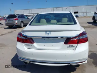 2017 Honda Accord Touring with VIN 1HGCR3F93HA040834, listed as a IAAI auction lot 41979952 with 79,686 mi miles and . Bid and sale history available at DreamBid. Image 17.