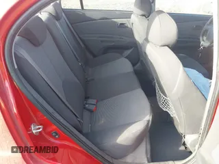 2009 Kia Rio LX with VIN KNADE223796485606, listed as a IAAI auction lot 41676881 with 58,852 mi miles and . Bid and sale history available at DreamBid. Image 8.