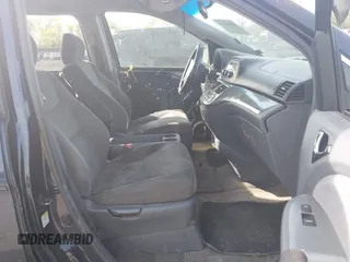 2005 Honda Odyssey EX with VIN 5FNRL38455B135555, listed as a IAAI auction lot 42080079 with 149,468 mi miles and . Bid and sale history available at carsss.com. Image 5.