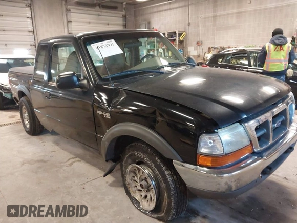 1999 Ford Ranger XL with VIN 1FTZR15V4XPB56809, listed as a IAAI auction lot 41874991 with 165,487 mi miles. Bid and sale history available at carsss.com. Image 1.