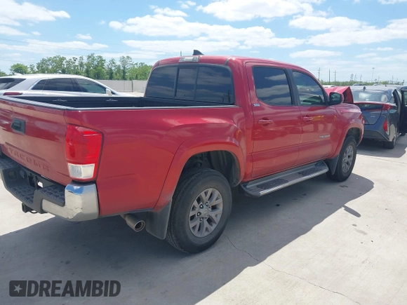 2016 Toyota Tacoma SR5 with VIN 5TFAX5GN2GX059826, listed as a IAAI auction lot 42032005 with 209,271 mi miles. Bid and sale history available at carsss.com. Image 4.