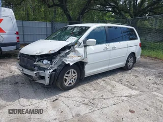 2010 Honda Odyssey EX with VIN 5FNRL3H5XAB015351, listed as a IAAI auction lot 42702296 with 202,919 mi miles and . Bid and sale history available at DreamBid. Image 2.