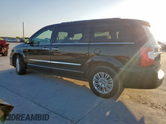 2012 Chrysler Town & Country Touring L with VIN 2C4RC1CG5CR269750, listed as a Copart auction lot 52524275 with 75,702 mi miles and Salvage Title. Bid and sale history available at DreamBid. Image 2.