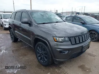 2019 Jeep Grand Cherokee Altitude z VIN 1C4RJFAG6KC703610, wystawiony jako IAAI lot #42541993 z przebiegiem 92 154 mil mil oraz . Historia ofert i sprzedaży dostępna na DreamBid. Obrazek 1.