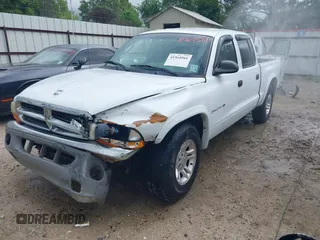 2000 Dodge Dakota Sport with VIN 1B7GL2AN4YS691223, listed as a IAAI auction lot 41964561 with 169,936 mi miles. Bid and sale history available at carsss.com. Image 2.