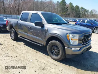 2021 Ford F-150 XL with VIN 1FTFW1E57MFB45980, listed as a IAAI auction lot 41775857 with 103,963 mi miles. Bid and sale history available at carsss.com. Image 1.