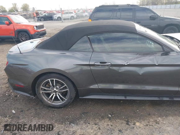 2017 Ford Mustang EcoBoost Premium z VIN 1FATP8UH5H5295852, wystawiony jako IAAI lot #41876517 z przebiegiem 132 910 mil mil oraz . Historia ofert i sprzedaży dostępna na DreamBid. Obrazek 19.