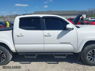 2023 Toyota Tacoma 4WD SR with VIN 3TMCZ5AN8PM647523, listed as a IAAI auction lot 41887896 with 17,864 mi miles. Bid and sale history available at carsss.com. Image 13.