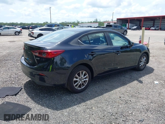 2016 Mazda 3 i Touring with VIN 3MZBM1V71GM298748, listed as a IAAI auction lot 42389384 with 65,564 mi miles and . Bid and sale history available at DreamBid. Image 4.