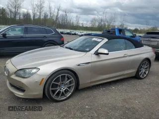 2012 BMW 6 Series 650i z VIN WBALZ3C52CC397545, wystawiony jako Copart lot #55976625 z przebiegiem 147 352 mil mil oraz Tytuł czysty. Historia ofert i sprzedaży dostępna na DreamBid. Obrazek 1.