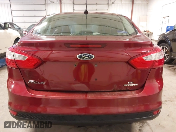2013 Ford Focus SE with VIN 1FADP3F2XDL200871, listed as a IAAI auction lot 41868961 with 223,703 mi miles and . Bid and sale history available at DreamBid. Image 16.