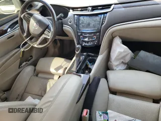 2014 Cadillac XTS Premium with VIN 2G61P5S36E9305491, listed as a Copart auction lot 44404425 with 104,710 mi miles and Salvage Title. Bid and sale history available at DreamBid. Image 8.