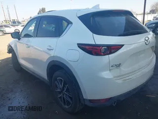 2017 Mazda CX-5 Grand Touring with VIN JM3KFBDL6H0164993, listed as a IAAI auction lot 41450556 with 97,733 mi miles. Bid and sale history available at carsss.com. Image 3.