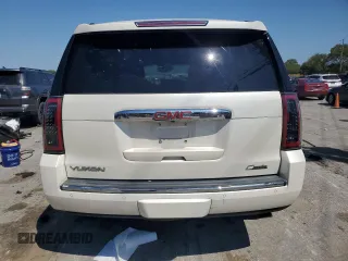 2015 GMC Yukon Denali with VIN 1GKS2CKJ3FR663324, listed as a Copart auction lot 70306614 with 154,234 mi miles and Salvage Title. Bid and sale history available at carsss.com. Image 6.