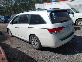 2016 Honda Odyssey EX-L with VIN 5FNRL5H62GB051628, listed as a IAAI auction lot 41911509 with 128,281 mi miles. Bid and sale history available at carsss.com. Image 3.