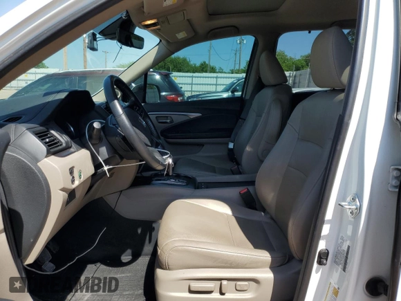 2021 Honda Pilot EX-L with VIN 5FNYF6H52MB096077, listed as a Copart auction lot 56970435 with 59,749 mi miles and Salvage title. Bid and sale history available at DreamBid. Image 7.