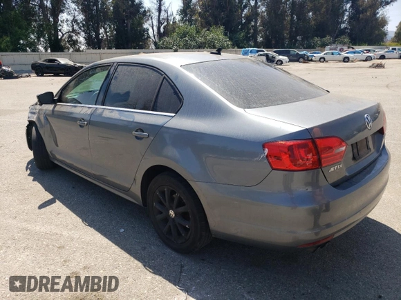 2013 Volkswagen Jetta SE with VIN 3VWDP7AJ5DM355176, listed as a Copart auction lot 60324525 with 192,226 mi miles and Salvage title. Bid and sale history available at DreamBid. Image 2.