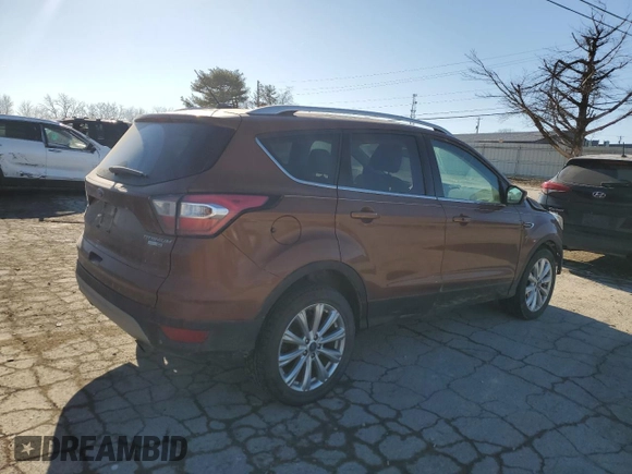 2017 Ford Escape Titanium with VIN 1FMCU9JDXHUA78843, listed as a Copart auction lot 42809485 with 93,562 mi miles and Salvage Title. Bid and sale history available at carsss.com. Image 3.
