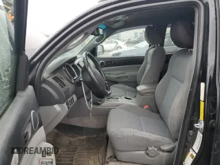 2009 Toyota Tacoma with VIN 3TMLU42N59M024127, listed as a Copart auction lot 51152195 with 213,513 mi miles and Salvage Title. Bid and sale history available at DreamBid. Image 7.