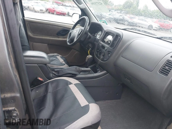 2005 Ford Escape XLS Value with VIN 1FMYU02Z75KC71339, listed as a IAAI auction lot 42373191 with 143,639 mi miles and . Bid and sale history available at DreamBid. Image 5.