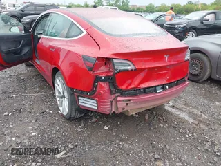 2018 Tesla Model 3 Long Range Battery with VIN 5YJ3E1EA6JF052659, listed as a IAAI auction lot 42093903 with 49,255 mi miles and . Bid and sale history available at DreamBid. Image 6.