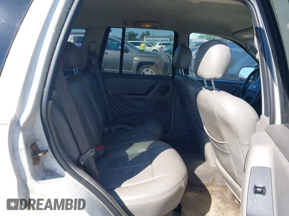 2002 Jeep Grand Cherokee Laredo with VIN 1J4GW48SX2C247709, listed as a IAAI auction lot 42444030 with 196,591 mi miles and . Bid and sale history available at DreamBid. Image 8.
