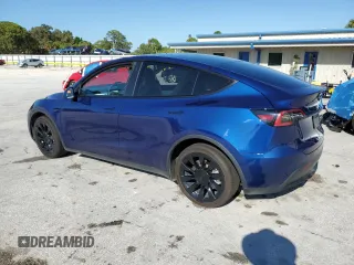 2020 Tesla Model Y Long Range with VIN 5YJYGDEE8LF034719, listed as a Copart auction lot 50888365 with 55,307 mi miles and Salvage Title. Bid and sale history available at DreamBid. Image 2.