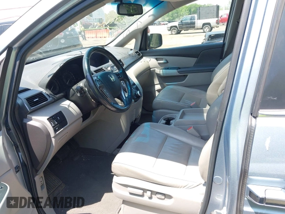 2011 Honda Odyssey EX-L with VIN 5FNRL5H60BB051135, listed as a IAAI auction lot 42588994 with 195,112 mi miles and . Bid and sale history available at DreamBid. Image 5.