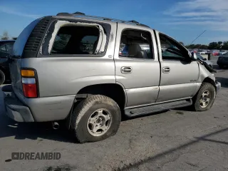 2000 GMC Yukon SLE with VIN 1GKEK13T2YJ130870, listed as a Copart auction lot 82887054 with 310,765 mi miles and Salvage Title. Bid and sale history available at carsss.com. Image 3.