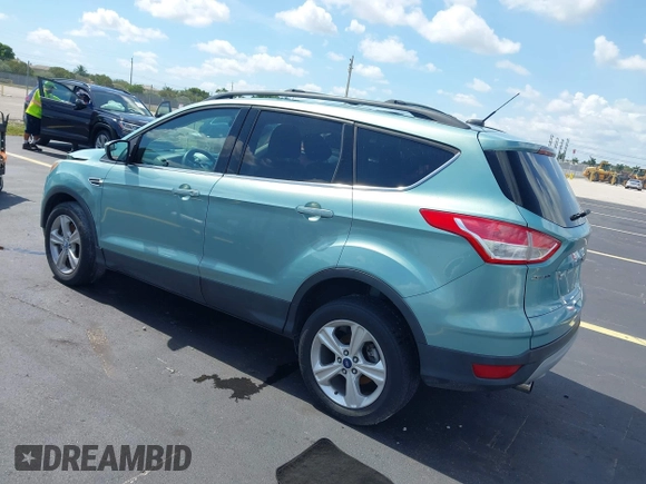 2013 Ford Escape SE with VIN 1FMCU9GX0DUC75662, listed as a IAAI auction lot 42549360 with 156,666 mi miles and . Bid and sale history available at DreamBid. Image 3.