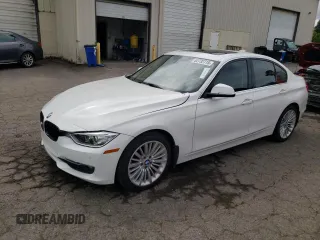 2014 BMW 3 Series 328i with VIN WBA3C1C53EK116366, listed as a Copart auction lot 62732715 with 106,727 mi miles and Clean title. Bid and sale history available at DreamBid. Image 1.