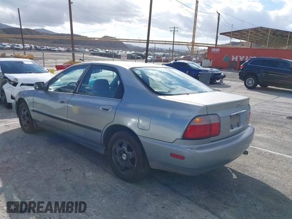 1996 Honda Accord LX with VIN 1HGCD5634TA291036, listed as a IAAI auction lot 41583543 with 166,725 mi miles and . Bid and sale history available at carsss.com. Image 3.