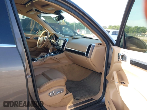 2011 Porsche Cayenne S Hybrid with VIN WP1AE2A29BLA94414, listed as a IAAI auction lot 41644386 with 76,095 mi miles. Bid and sale history available at carsss.com. Image 5.