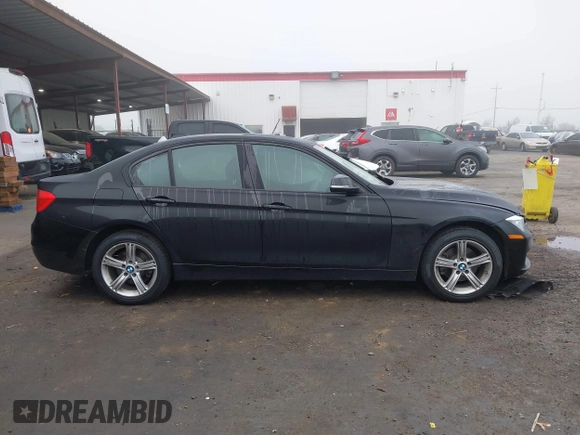 2014 BMW 3 Series 328i with VIN WBA3C1C55EK113128, listed as a IAAI auction lot 41259472 with 82,798 mi miles. Bid and sale history available at carsss.com. Image 12.