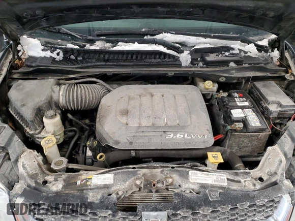 2017 Dodge Grand Caravan Crew Plus with VIN 2C4RDGDG3HR702035, listed as a Copart auction lot 46944875 with 214,058 mi miles and Salvage Title. Bid and sale history available at DreamBid. Image 12.