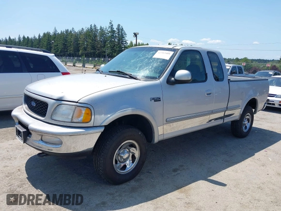 1997 Ford F-150 XL with VIN 1FTDX1868VKB26243, listed as a IAAI auction lot 42383401 with 196,020 mi miles and . Bid and sale history available at DreamBid. Image 2.