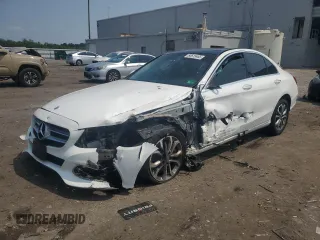 2017 Mercedes-Benz C 300 with VIN 55SWF4KB2HU220007, listed as a Copart auction lot 60615465 with 50,630 mi miles and Salvage title. Bid and sale history available at DreamBid. Image 1.