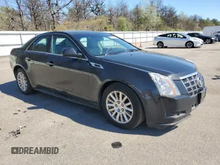 2012 Cadillac CTS Luxury with VIN 1G6DE5E55C0118007, listed as a Copart auction lot 56321185 with 146,653 mi miles and Salvage Title. Bid and sale history available at DreamBid. Image 4.