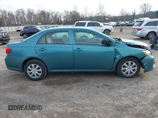 2009 Toyota Corolla with VIN JTDBL40E29J017358, listed as a IAAI auction lot 41041604 with 233,205 mi miles. Bid and sale history available at carsss.com. Image 13.