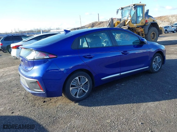2022 Hyundai Ioniq Plug-In Hybrid SE with VIN KMHC65LD1NU278652, listed as a IAAI auction lot 41828778 with 57,711 mi miles. Bid and sale history available at carsss.com. Image 4.