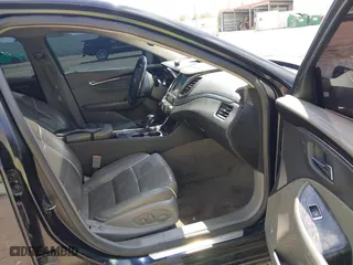 2014 Chevrolet Impala LTZ with VIN 1G1155S34EU145366, listed as a IAAI auction lot 41880712 with 171,000 mi miles. Bid and sale history available at carsss.com. Image 5.
