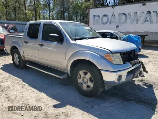 2005 Nissan Frontier LE with VIN 1N6AD07UX5C420692, listed as a Copart auction lot 49714825 with 239,822 mi miles and Salvage title. Bid and sale history available at DreamBid. Image 4.
