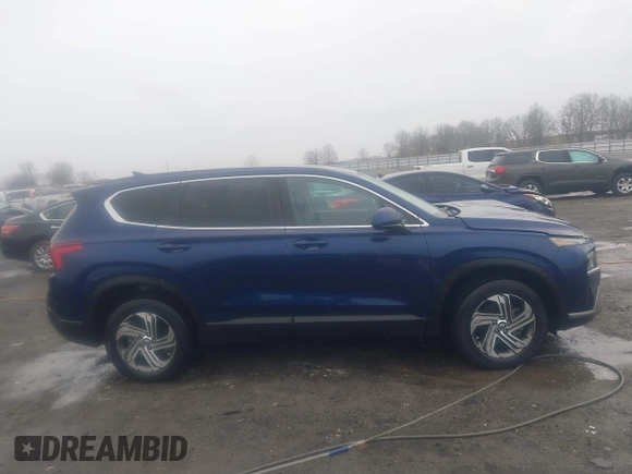 2022 Hyundai Santa Fe SE z VIN 5NMS14AJ8NH406846, wystawiony jako IAAI lot #41588202 z przebiegiem 34 006 mil mil oraz . Historia ofert i sprzedaży dostępna na DreamBid. Obrazek 13.