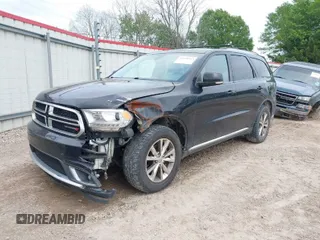 2014 Dodge Durango Limited with VIN 1C4RDHDG4EC595975, listed as a IAAI auction lot 41920553 with 242,949 mi miles. Bid and sale history available at carsss.com. Image 1.