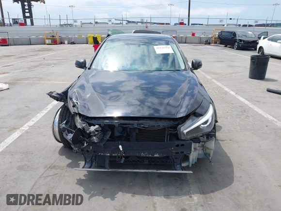 2014 Infiniti Q50 Premium z VIN JN1BV7AP3EM690571, wystawiony jako IAAI lot #42136354 z przebiegiem 191 969 mil mil oraz . Historia ofert i sprzedaży dostępna na DreamBid. Obrazek 12.
