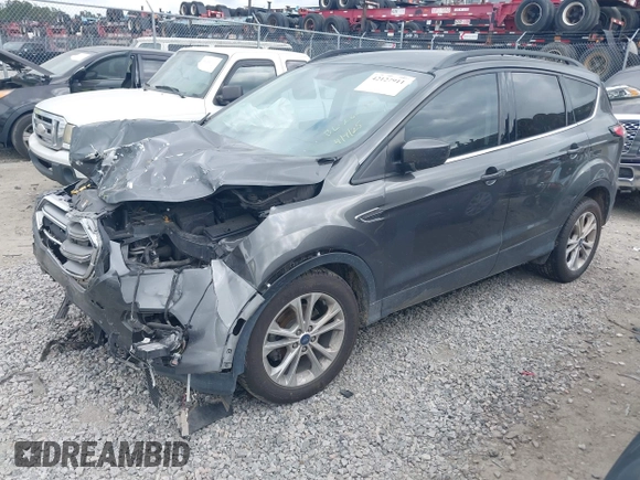 2017 Ford Escape SE z VIN 1FMCU0GD8HUE00754, wystawiony jako IAAI lot #42127911 z przebiegiem 169 487 mil mil oraz . Historia ofert i sprzedaży dostępna na DreamBid. Obrazek 17.