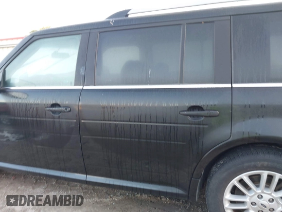 2014 Ford Flex SEL z VIN 2FMGK5C8XEBD24744, wystawiony jako IAAI lot #42365734 z przebiegiem 209 904 mil mil oraz . Historia ofert i sprzedaży dostępna na DreamBid. Obrazek 14.