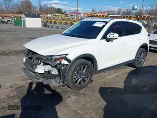 2018 Mazda CX-5 Grand Touring with VIN JM3KFBDM6J0435579, listed as a IAAI auction lot 41208899 with 131,212 mi miles. Bid and sale history available at carsss.com. Image 18.