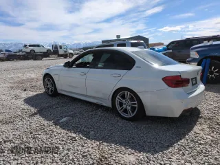 2018 BMW 3 Series 330e iPerformance with VIN WBA8E1C59JA756629, listed as a Copart auction lot 49061185 with 82,420 mi miles and Salvage Title. Bid and sale history available at carsss.com. Image 2.
